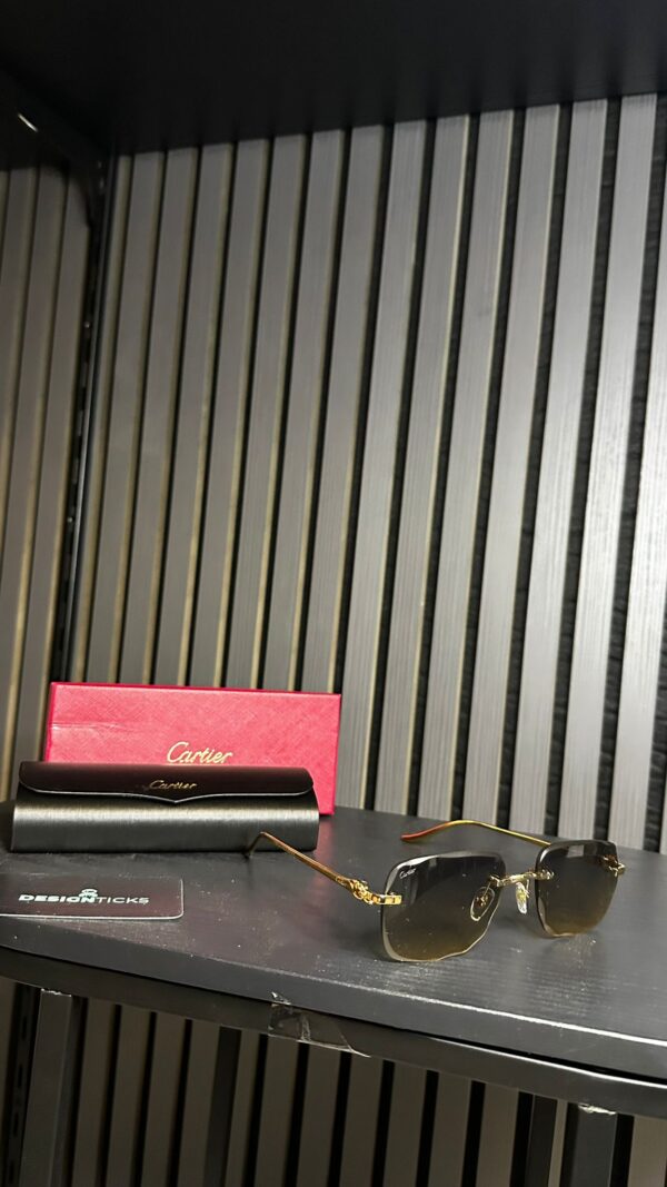 Cartier Gold With Black Glasses